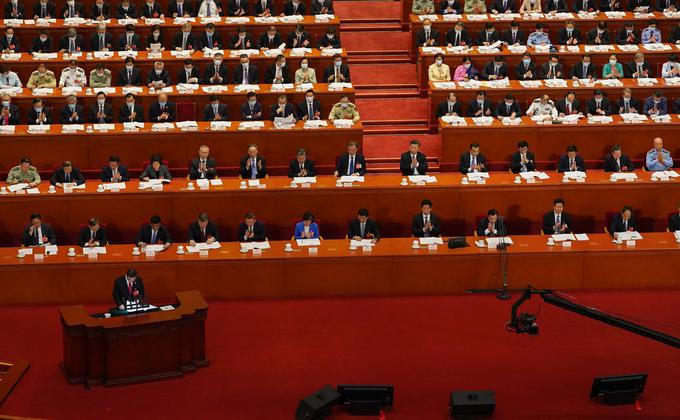 13名代表中仅有陈云英一人出生在台湾。身为中国人大台湾代表团的团长虽说自己「就是台南市人」,但他出生中国,也长在中国,他却是代表团团长。(图片来源:Andrea Verdelli/Getty Images)